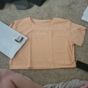 Huge workout lot size small including alphalete, puma, etc